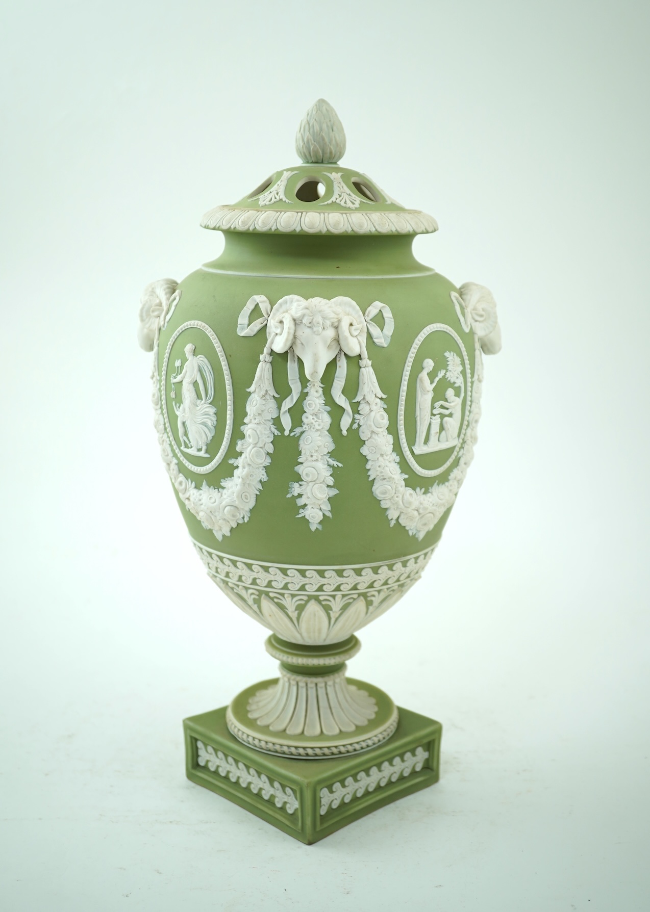 A Wedgwood green jasperware covered pot pourri urn, early 19th century